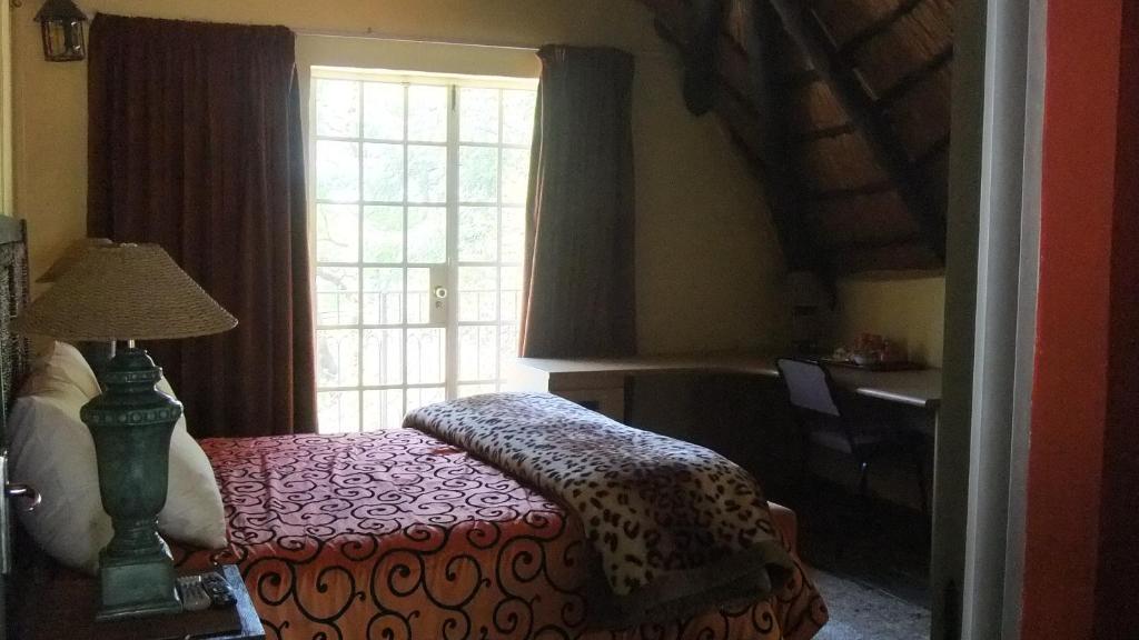 Treetops & Treats Guest House Pretoria-Noord Δωμάτιο φωτογραφία